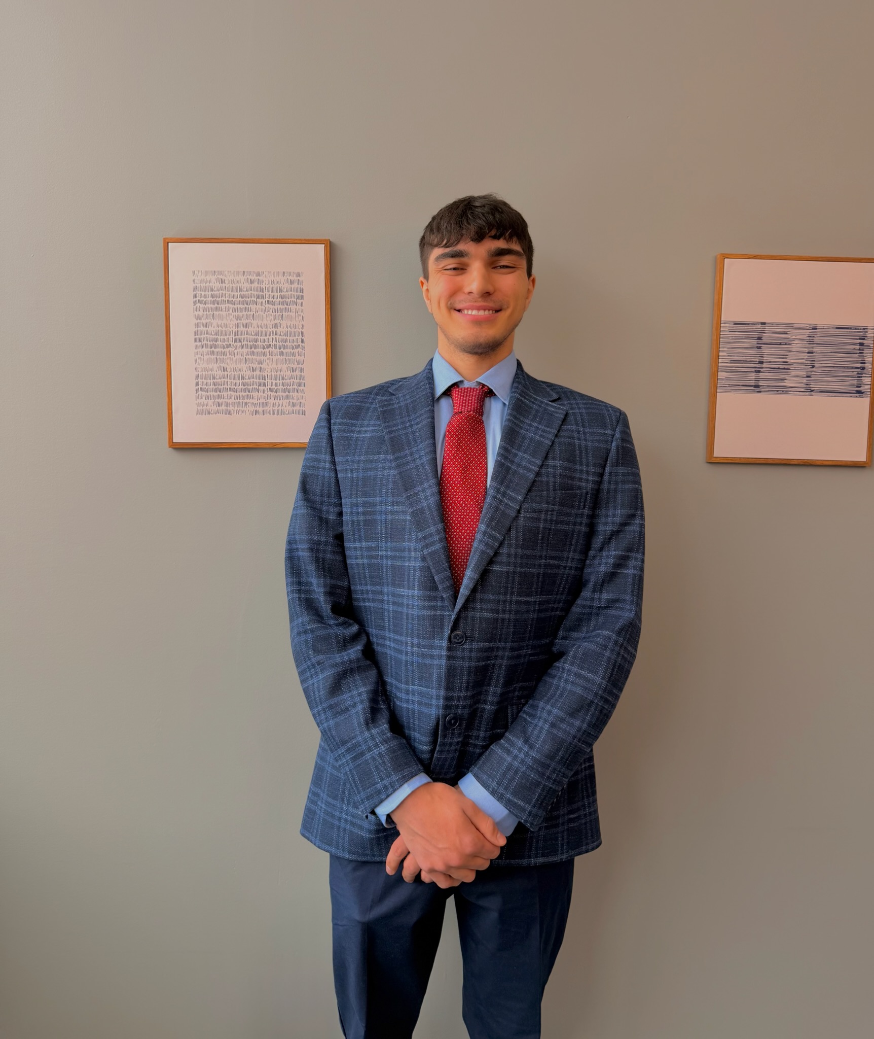 Professional in plaid suit